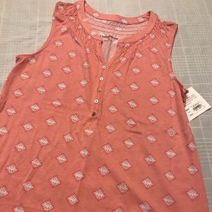 Women’s button sleeveless top